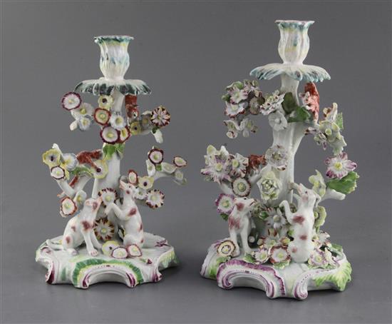 Two matching early Derby candlestick groups, c.1756-9 h. 22cm and 23.5cm, restorations